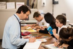A teacher highlights the important of items to students
