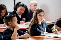 A student records ideas for later